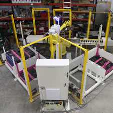 Read more about the article Robot Palletizers